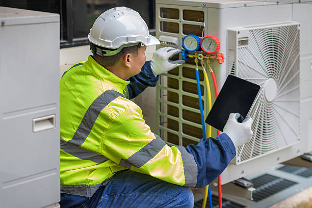 Professional Hvac technician working in Mastic, NY